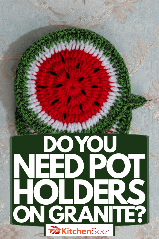 Two watermelon designed pot holder hanged on the kitchen wall, Do You Need Pot Holders On Granite?