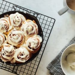 Homemade cinnamon rolls or buns baked in a cast iron skillet and covered with cream cheese icing, What Flour To Use For Cinnamon Rolls?