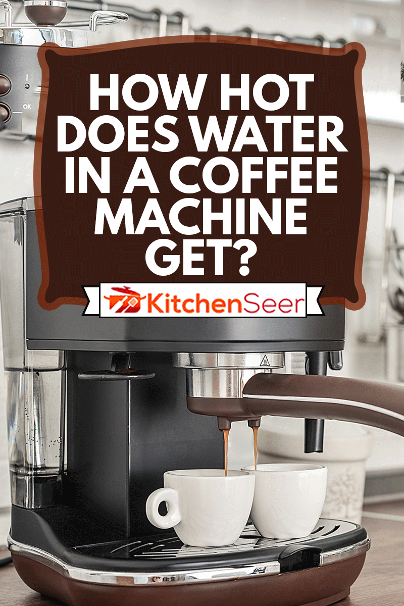 Coffeemaker with two cups in interior of modern kitchen closeup, How Hot Does Water In A Coffee Machine Get?