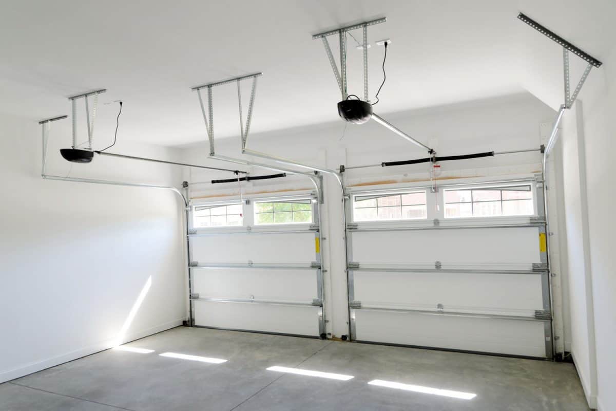 Interior of a garage door with visible rolling mechanism on the ceiling