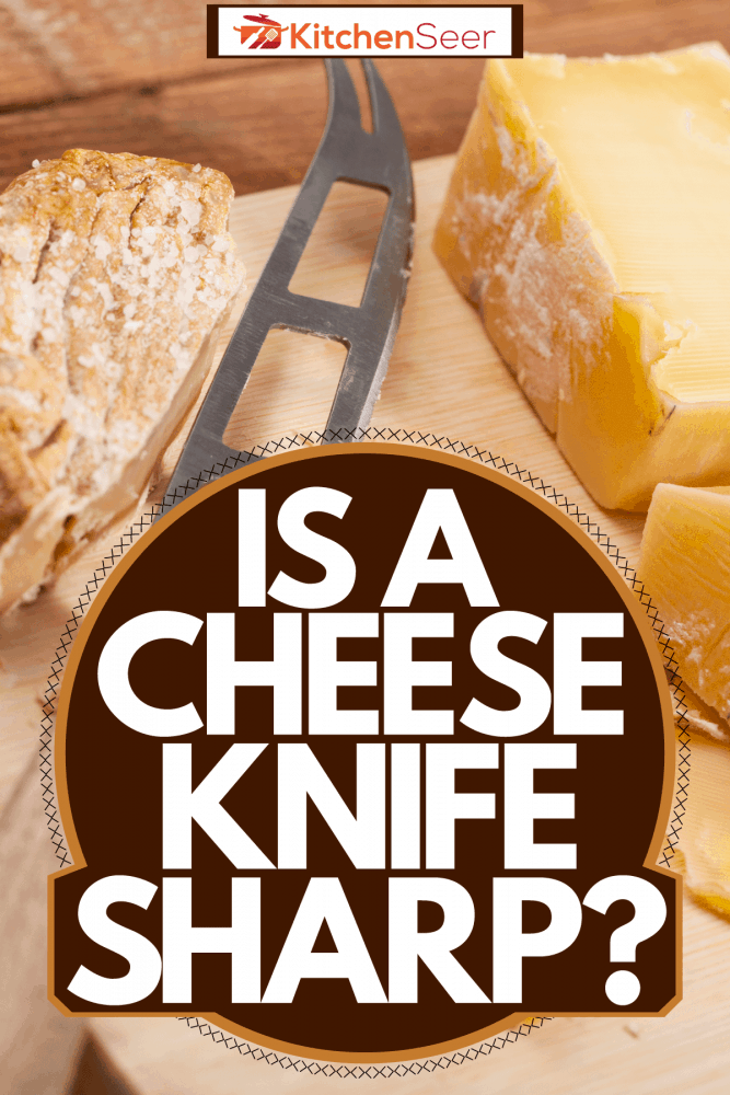 A cheese knife slicing cheese on a cheese board with chocolate coated almond nuts on the side, Is A Cheese Knife Sharp?