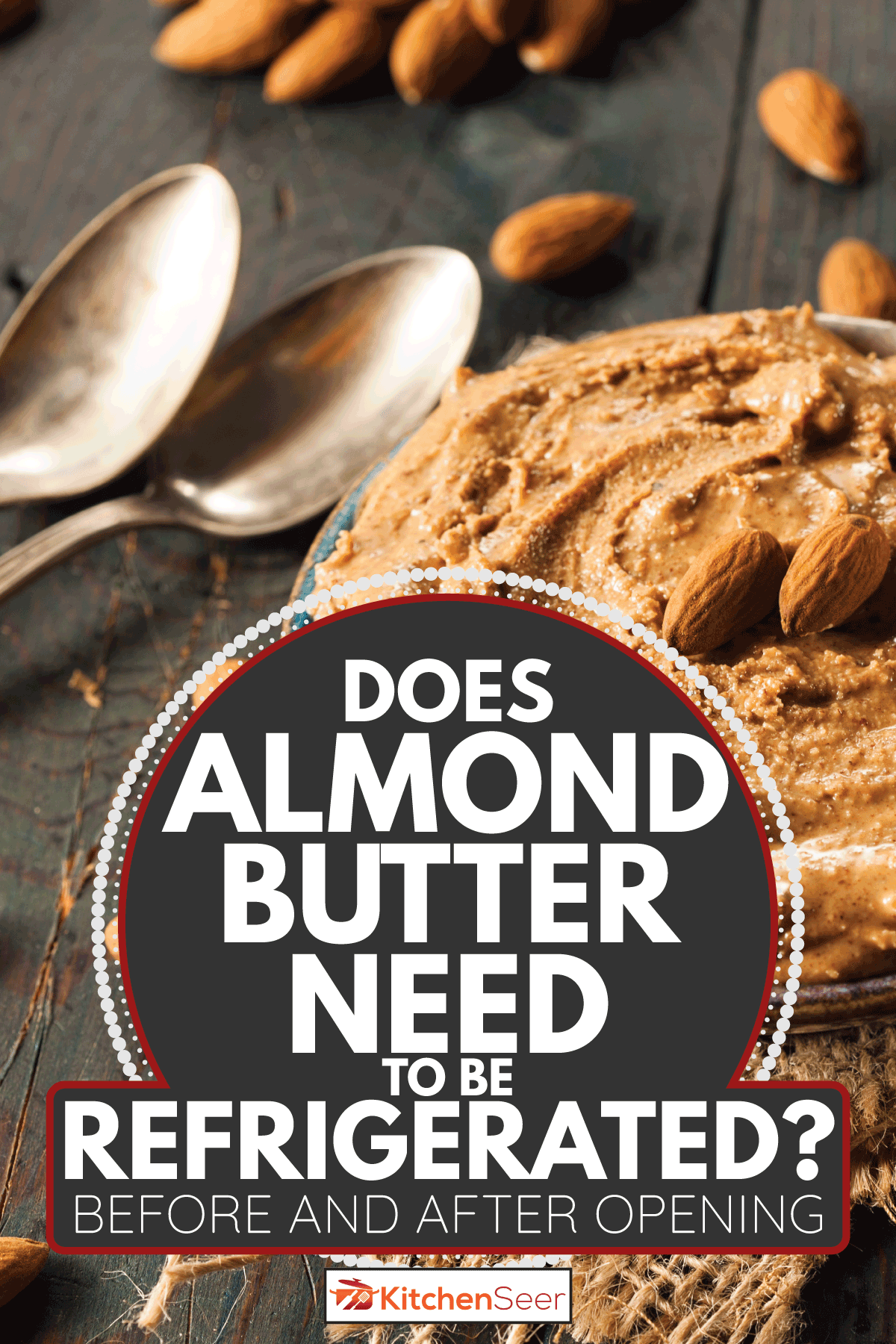 Raw Organic Almond Butter in a bowl, with spoons and and almonds on the background. Does Almond Butter Need To Be Refrigerated [Before And After Opening]