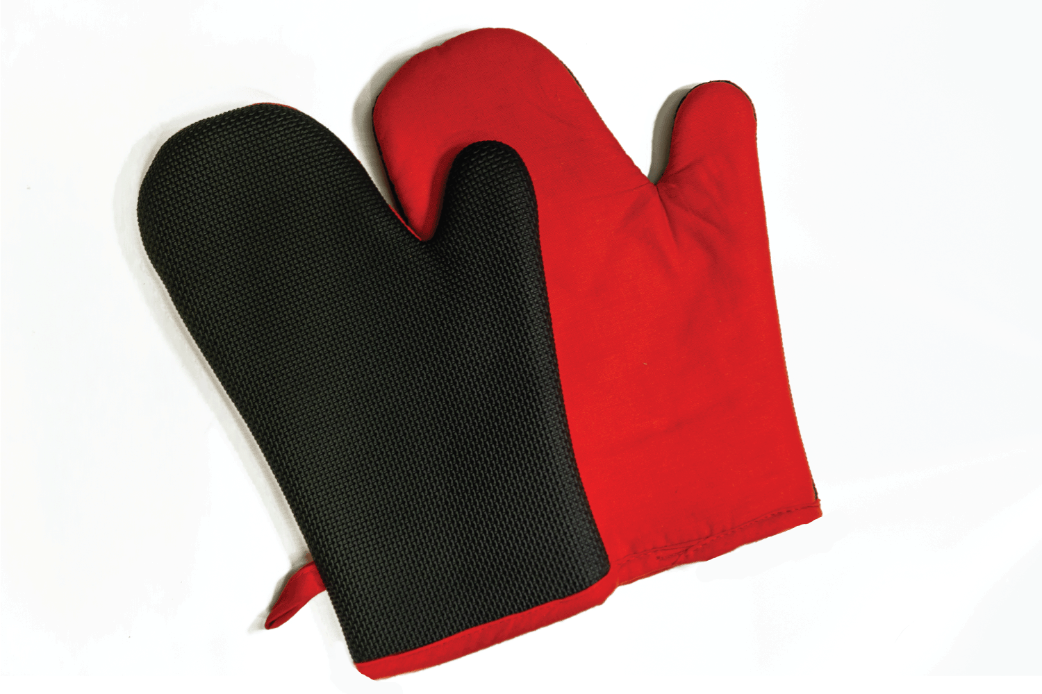 Red and black potholder gloves for kitchen isolated