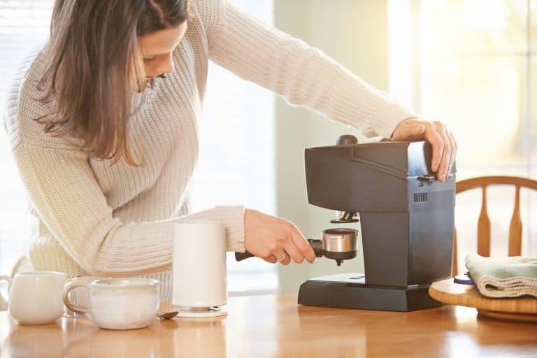 Shot of a woman making coffee at home, Can A Coffee Maker Be Used To Make Tea?