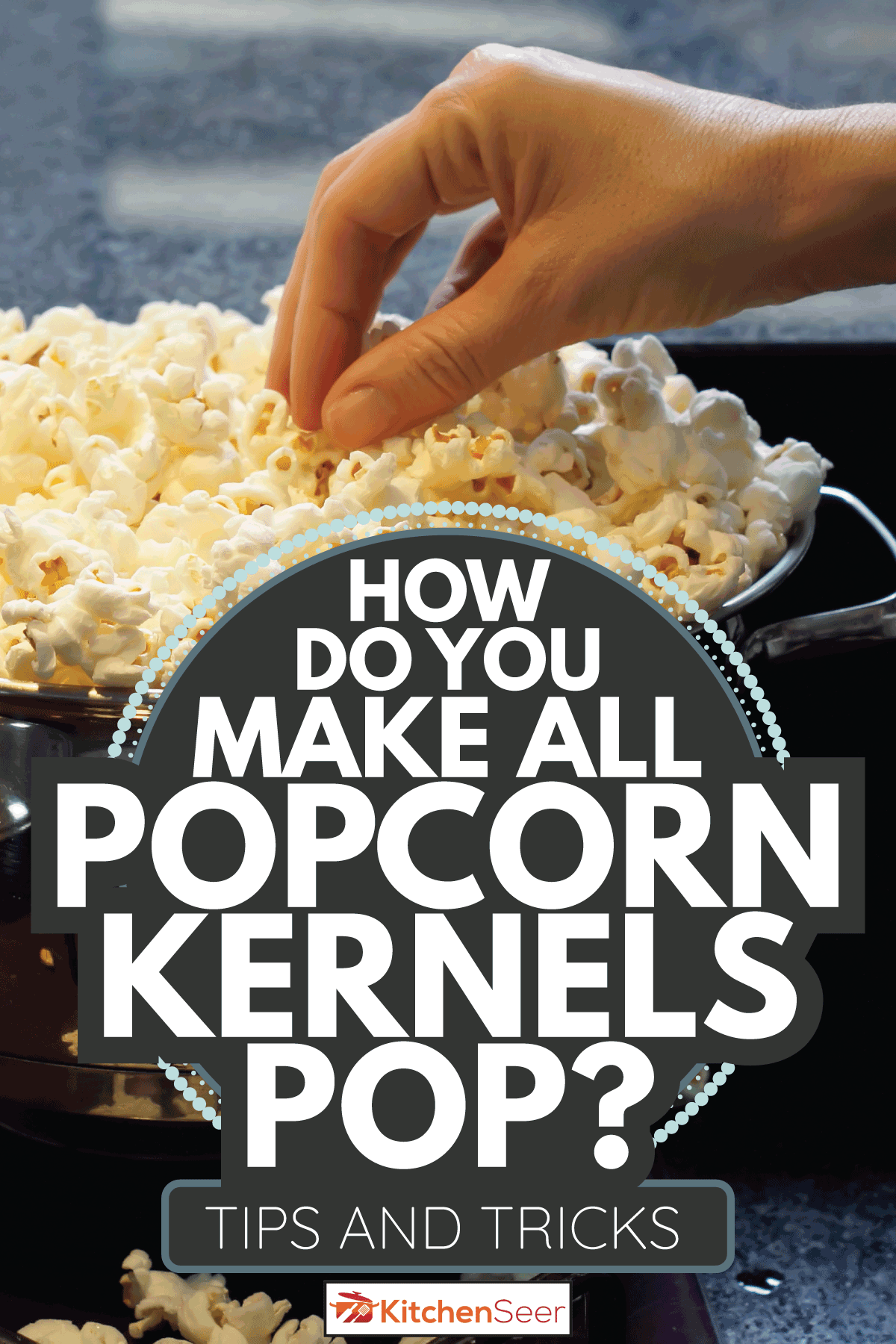 A stainless pan full of popcorn. hand picking puffs. How Do You Make All Popcorn Kernels Pop [Tips And Tricks]