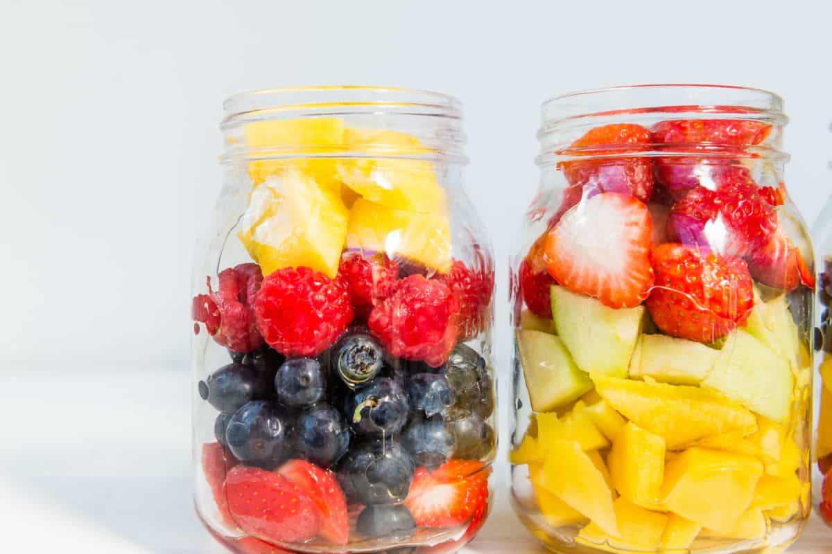Assorted fruits stored inside a jar