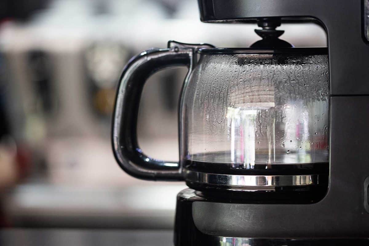 Coffee maker on the table with blurred background
