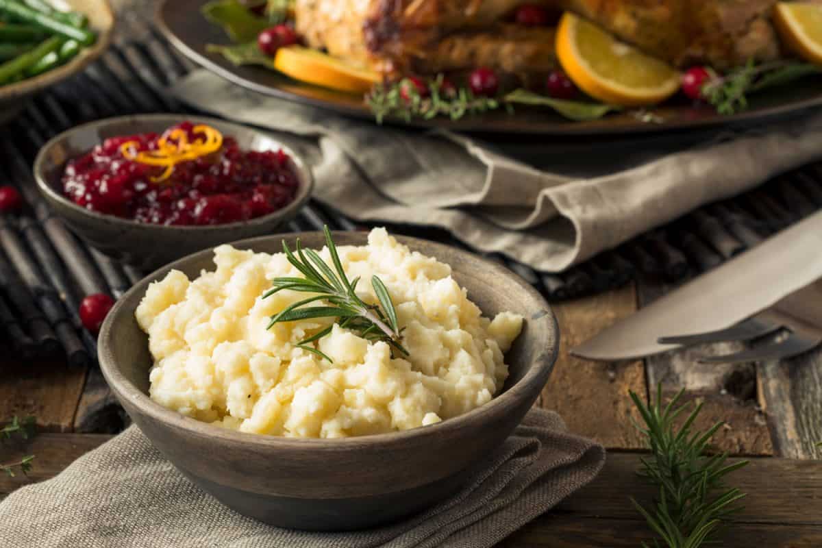 Delicious mashed potatoes and other foods on the table, How Far In Advance Can I Make Mashed Potatoes?