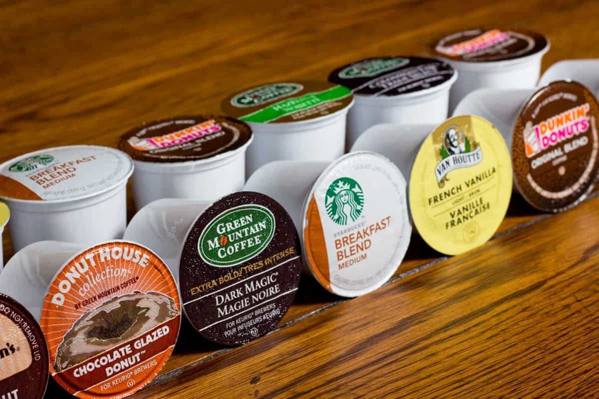 K-Cup coffee pods on wooden table