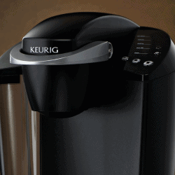 Keurig k-cup coffee maker with three k-cup pods. How To Clean A Keurig Needle [With And Without A Tool]