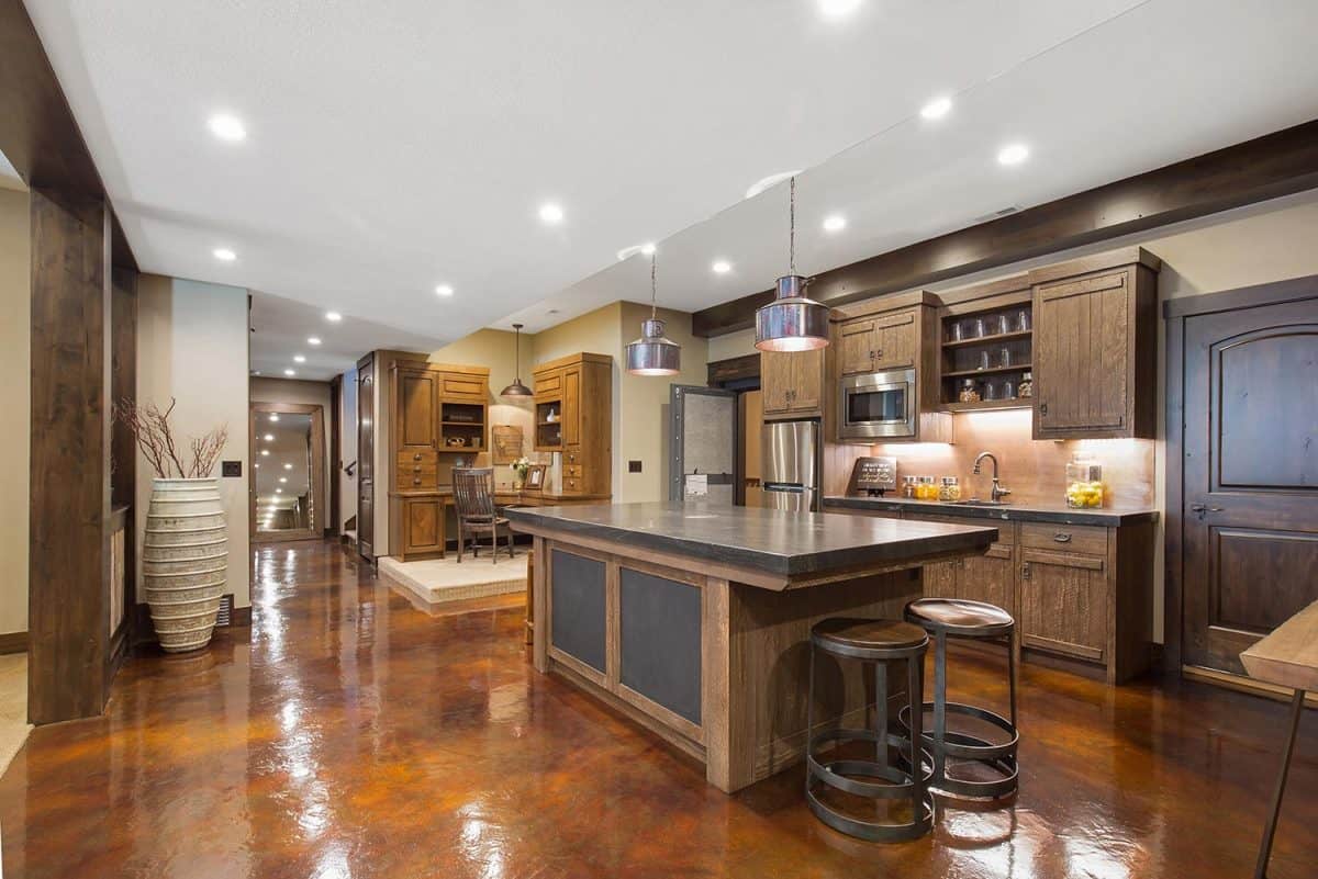 Showcase home with glossy basement flooring and large kitchen