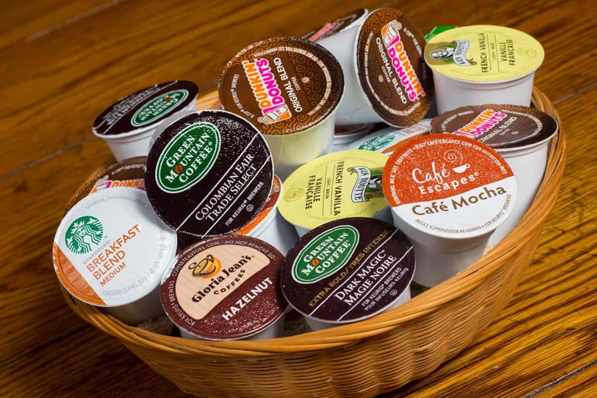 Variety of k cup coffee pods in a basket
