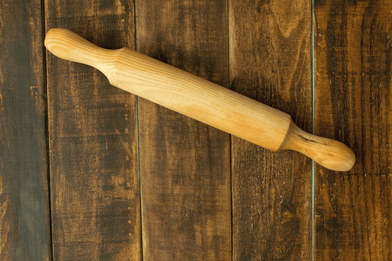 rolling pin on a wooden table.16 Types Of Rolling Pins To Know
