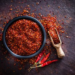 A bowl filled of cayenne pepper, How Long Does Cayenne Pepper Last? [With Tips On Proper Storage!]