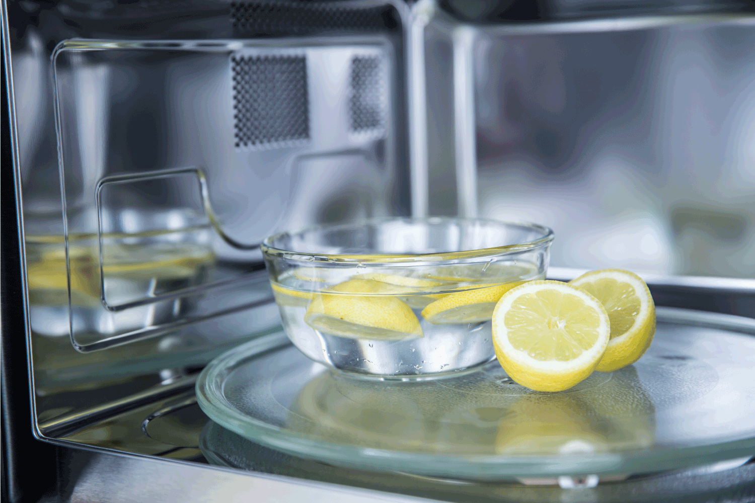 A method of cleaning in a microwave oven with water and lemon.