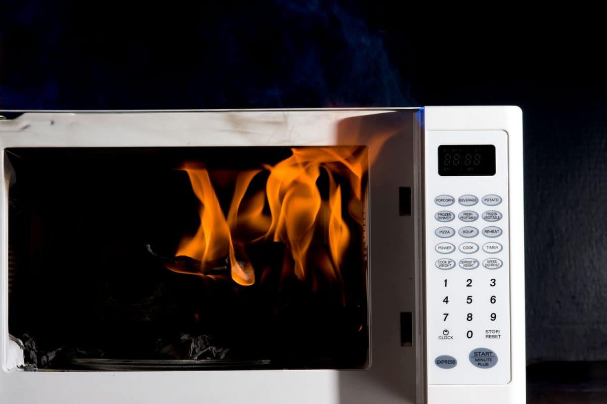 Close-up photo of a burning microwave