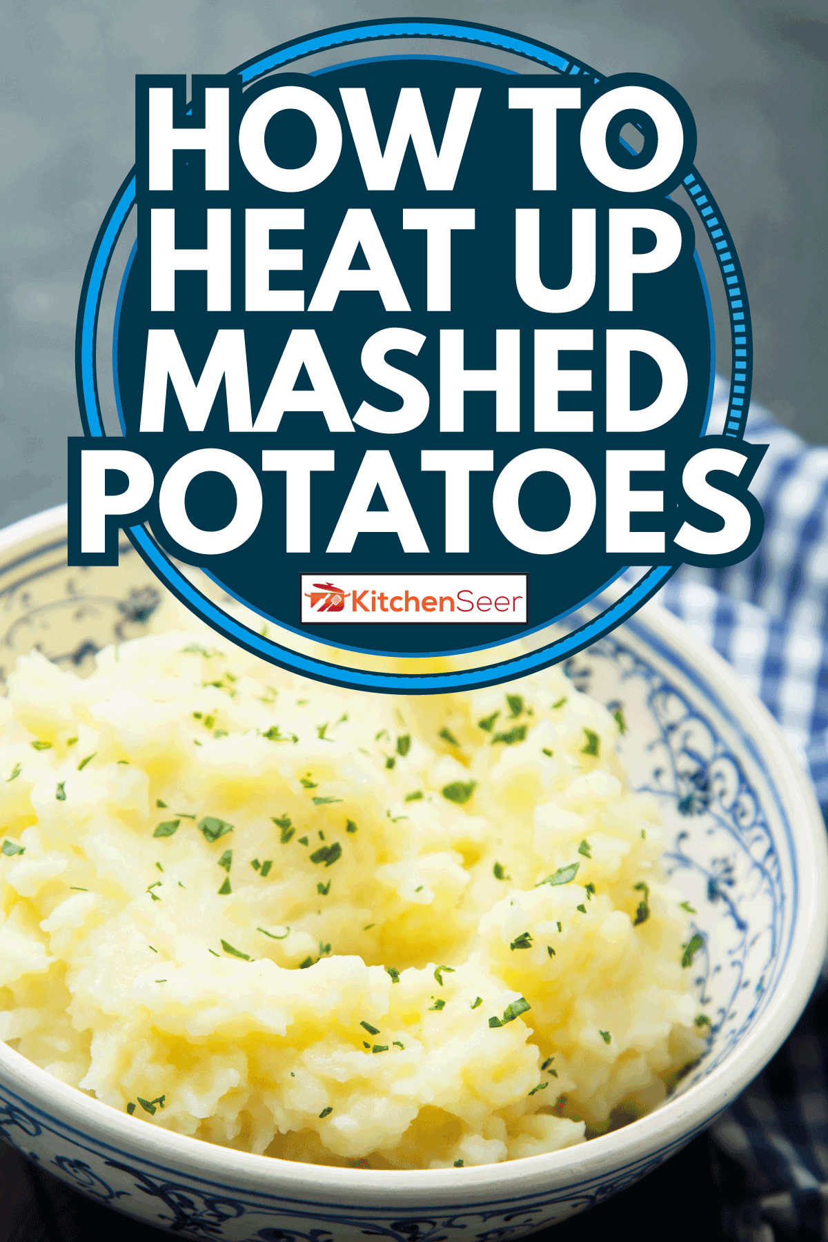 Homemade potato mash in a ceramic bowl with tablecloth on a wooden table. How To Heat Up Mashed Potatoes