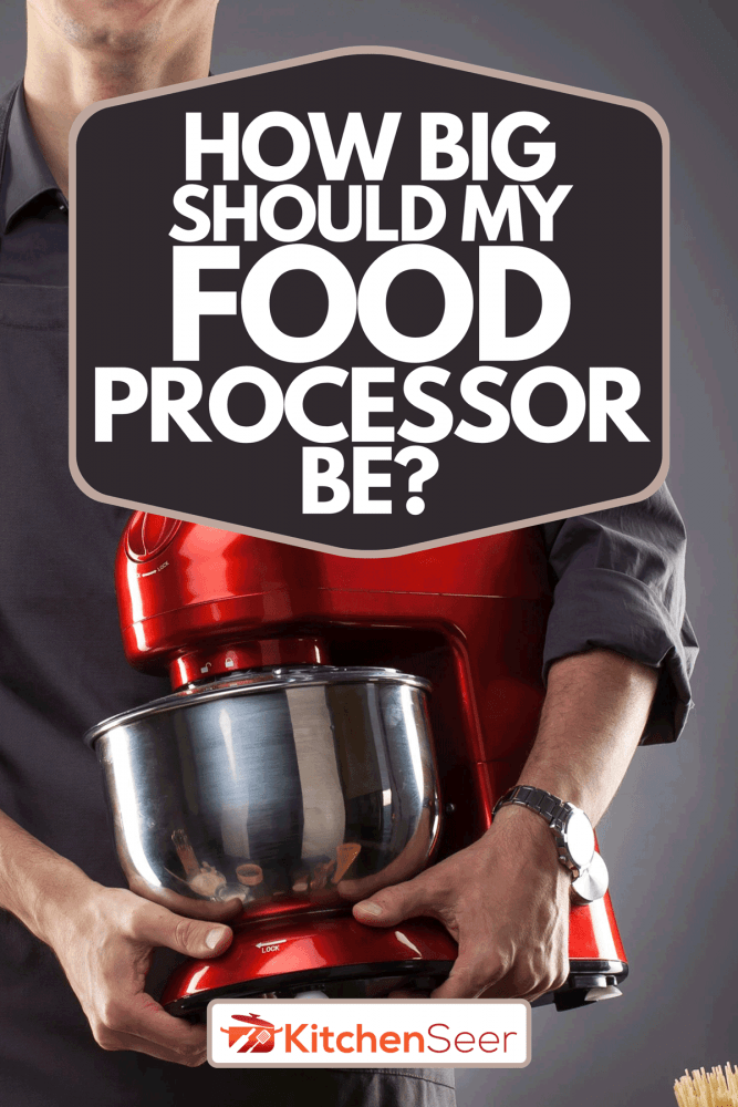 A man holding red food processor on a gray background, How Big Should My Food Processor Be?