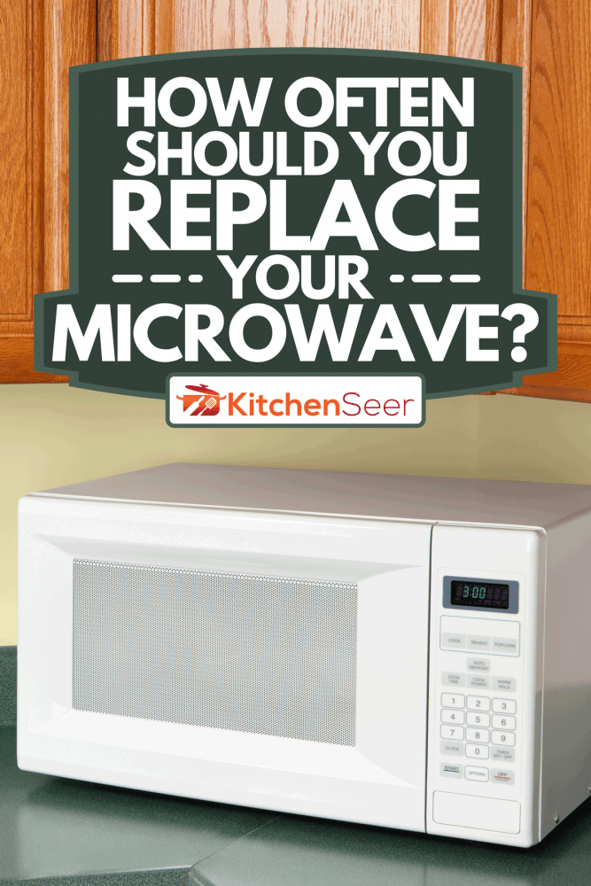 A microwave on a kitchen counter, How Often Should You Replace Your Microwave?