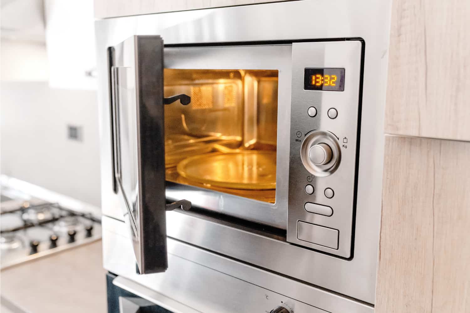 Modern kitchen microwave oven with its door open