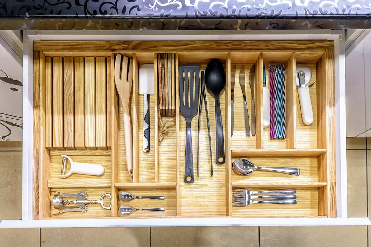 Opened kitchen drawer for smart solution for kitchen storage and organizing