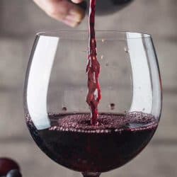 Pouring red wine into the glass, How Long Should You Take To Drink A Glass Of Wine?