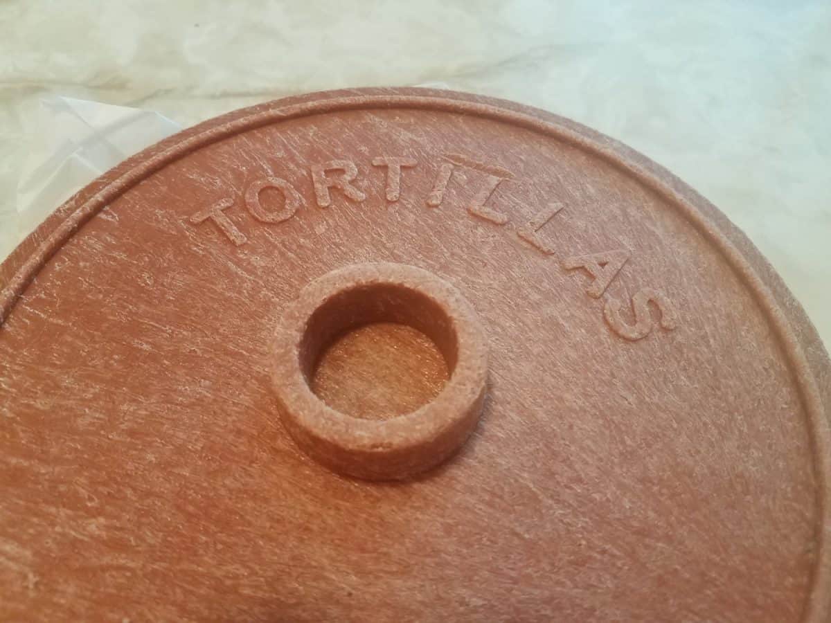 Red plastic circular tortilla container or warmer