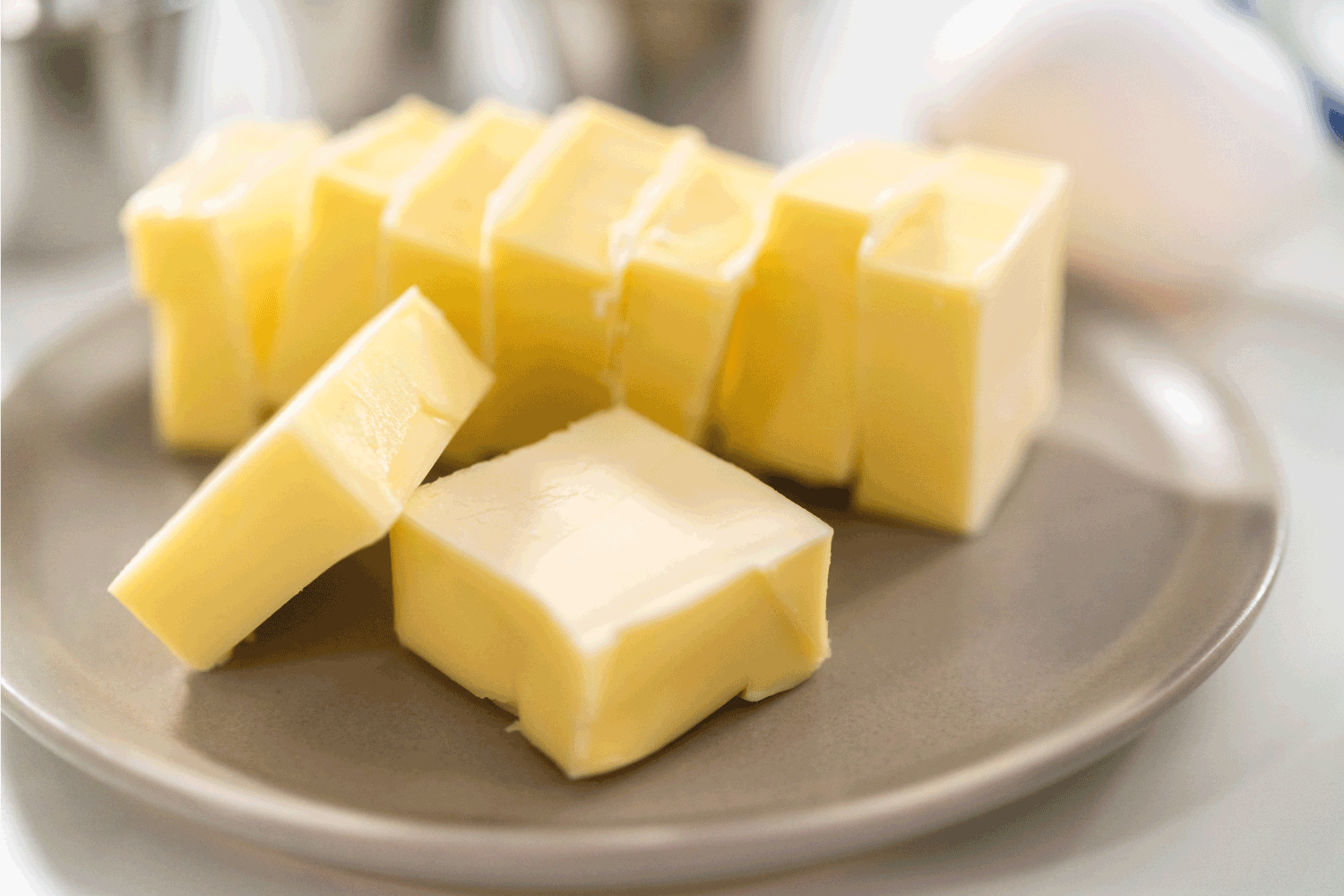Stick of butter sliced in small cubes for baking