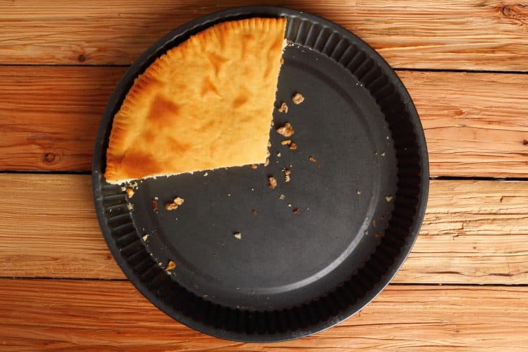 A big slice of freshly baked meat pie, How Deep Is A Pie Pan? [Inc. Deep Dish]