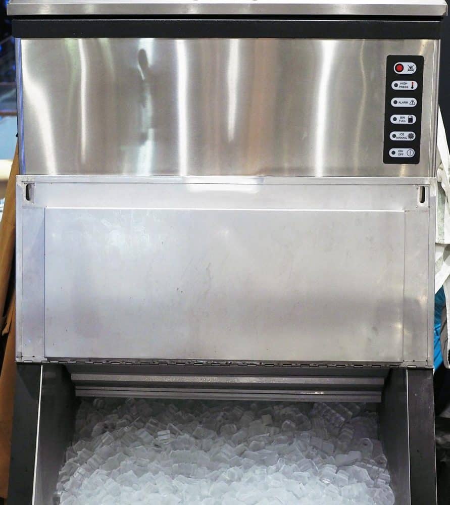 An ice making machine which placed in modern restaurant