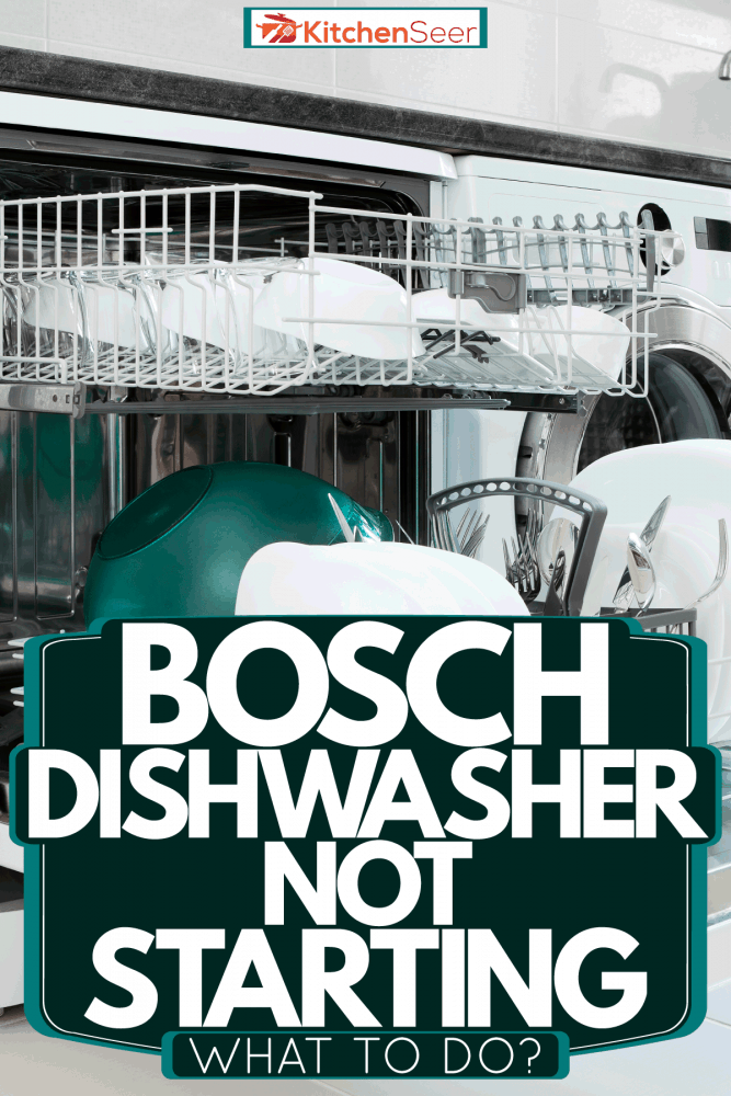 A dishwasher with clean plates, utensils and bowls, Bosch Dishwasher Not Starting - What To Do?