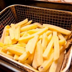 Cooking french fries in a deep fryer basket, 5 Best Oils To Use For Making French Fries