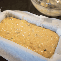 Courgette zucchini loaf cake mixture in a tin (before baking). How To Line A Loaf Pan With Parchment Paper Or Foil