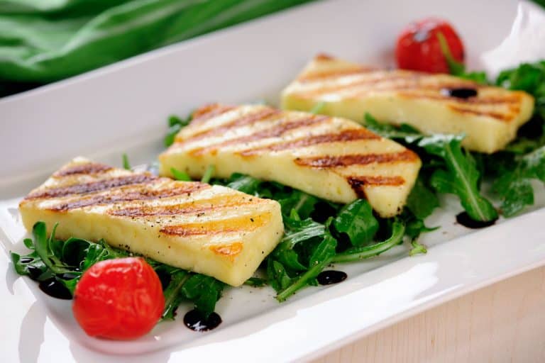 Delicious salad halloumi cheese with asparagus leaves and cherry tomatoes, Should You Cook Halloumi Cheese? [And How To!]