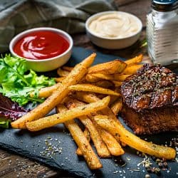 Grilled tenderloin with French fries and salad, How To Grill French Fries [Inc. 11 Must-Try Recipes]