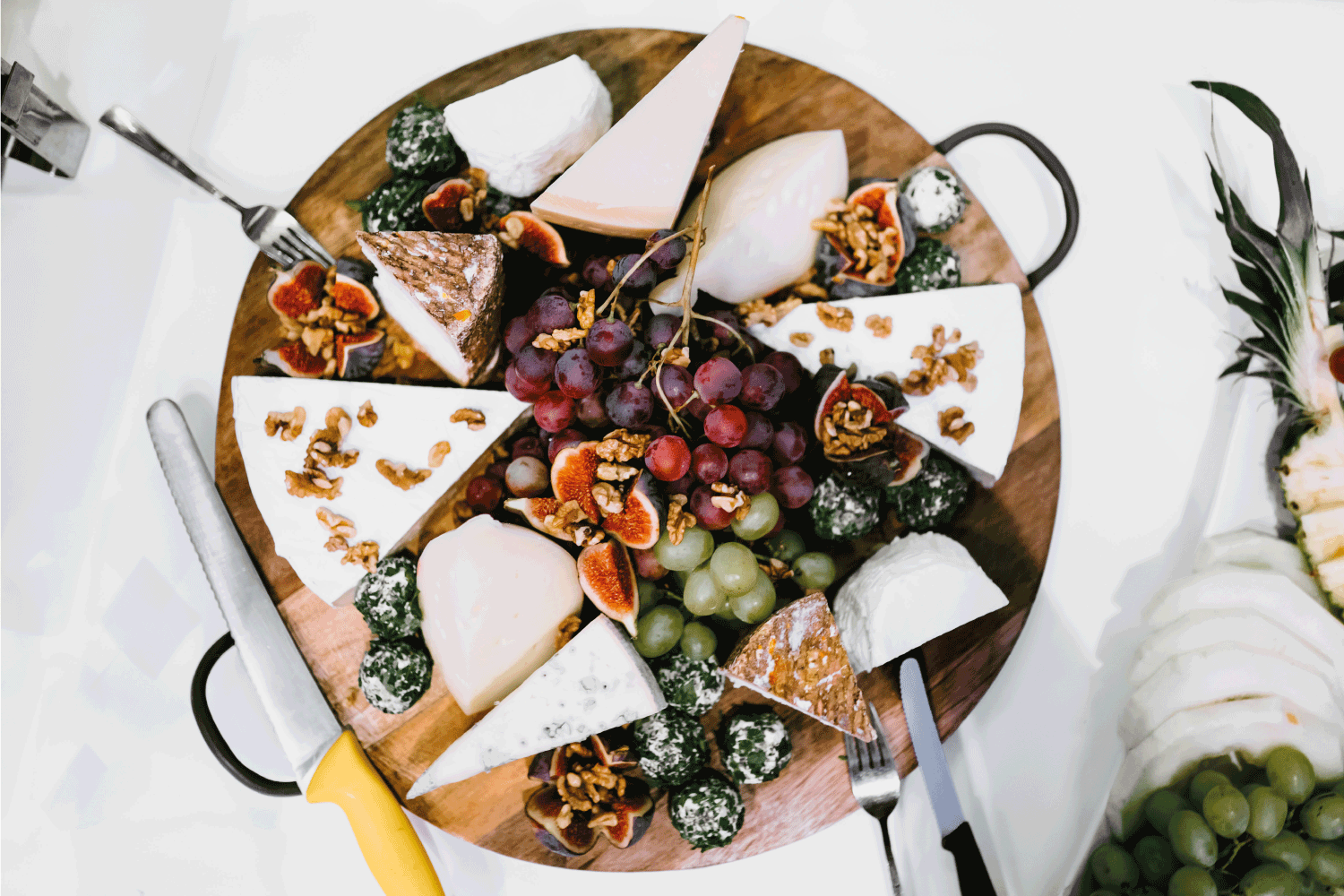 Photo of a plate with different types of cheese