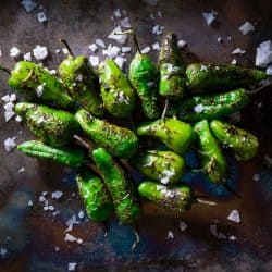 Pimientos del Padron tapas salted are Spain chili peppers, Does Frying Chili Make It Hotter Or Less Spicy?