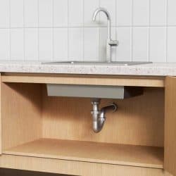 Plumbing system under a modern kitchen sink, How High Should Kitchen Sink Drain Be From Floor?