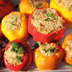 bright-stuffed-peppers-on-a-ceramic-tray.-How-Long-To-Cook-Stuffed-Peppers