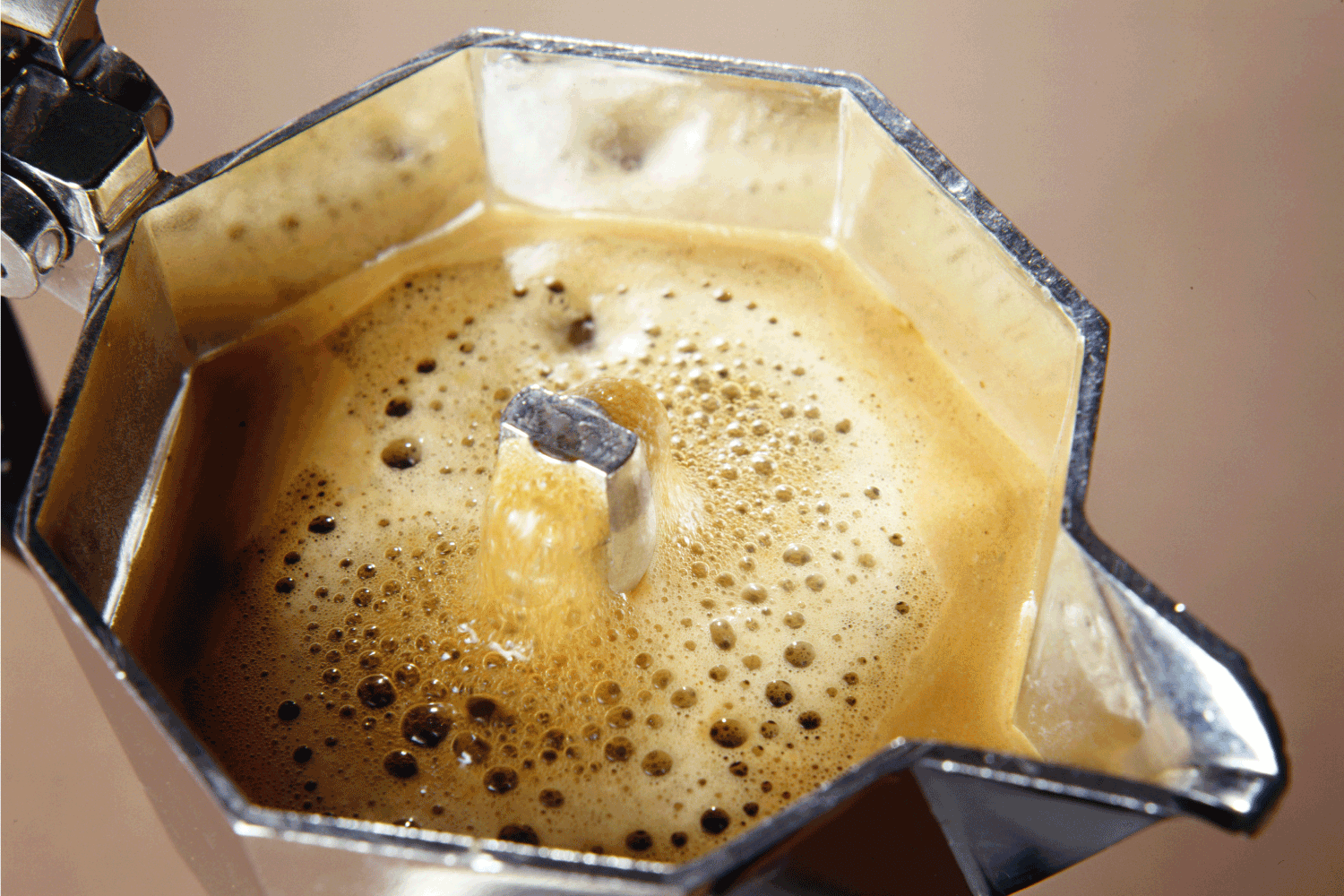 freshly percolated coffee inside a percolator