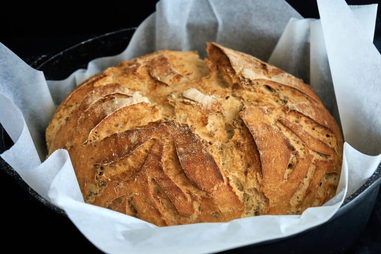 A freshly baked bread, Should You Preheat A Dutch Oven For Bread?
