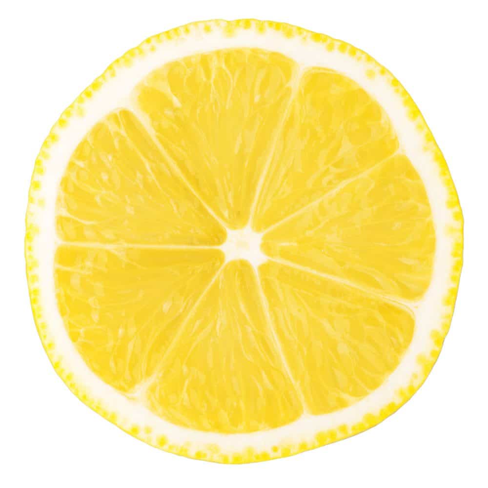 A slice of lemon juice on a white background