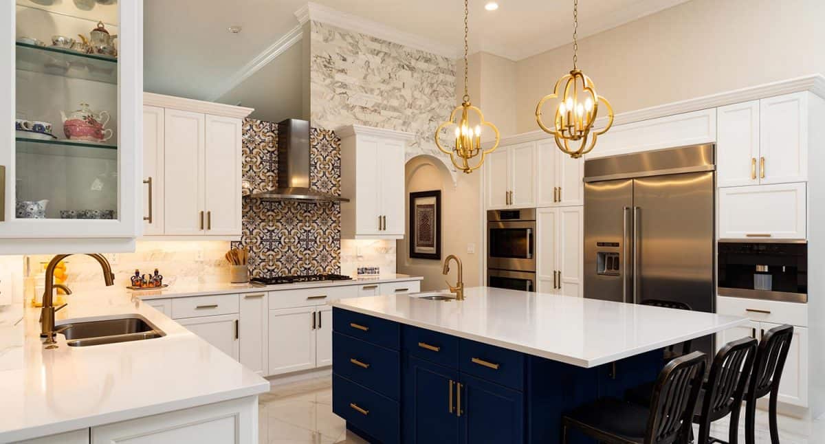 Beautiful luxury estate home kitchen with white cabinets