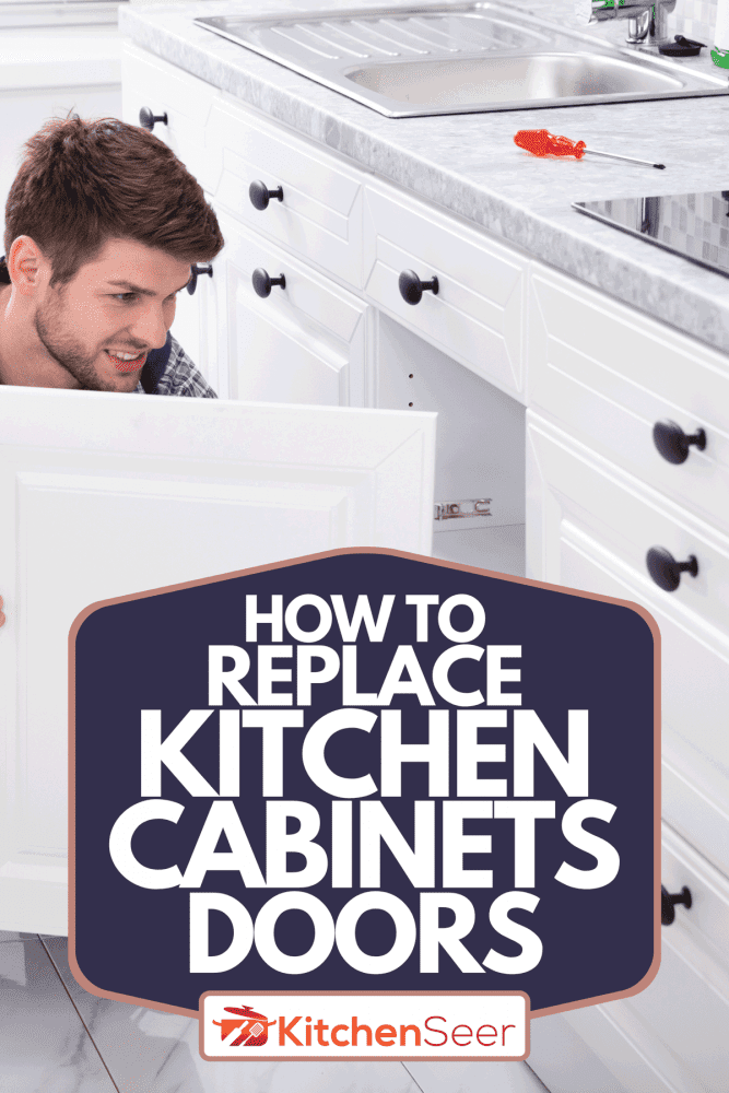 A handyman fitting a new cabinet door under the kitchen worktop, How To Replace Kitchen Cabinets Doors