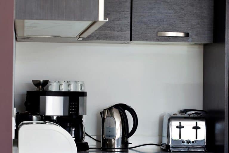Kitchen appliances on a modern kitchen, Should Kitchen Cabinet Hardware Match Appliances?