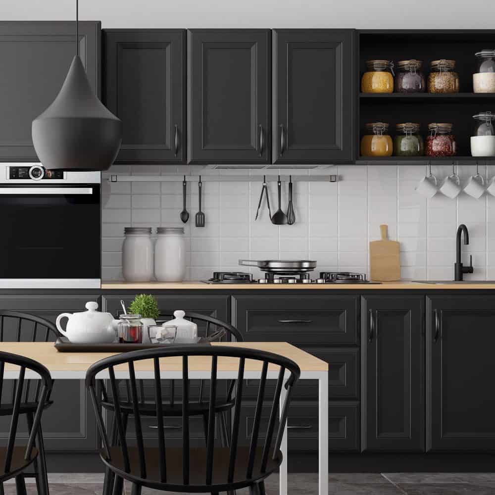 Modern Scandinavian kitchen and dining room with matte black traditional cabinet