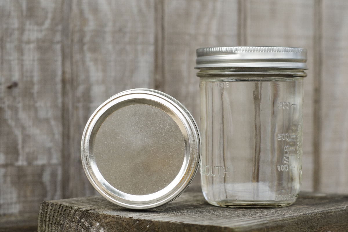 Rustic mason jars with moonshine