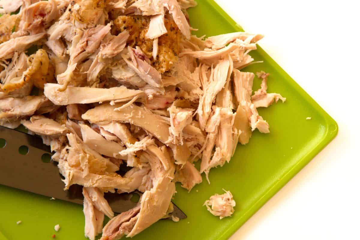 Shredded chicken on a green plate