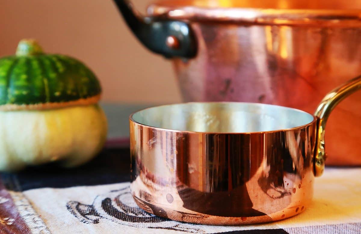 A copper pot on the table