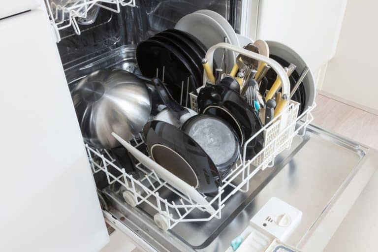 A dishwasher filled with plates and other kinds of kitchen utensils, Are All Dishwashers A Standard Size?